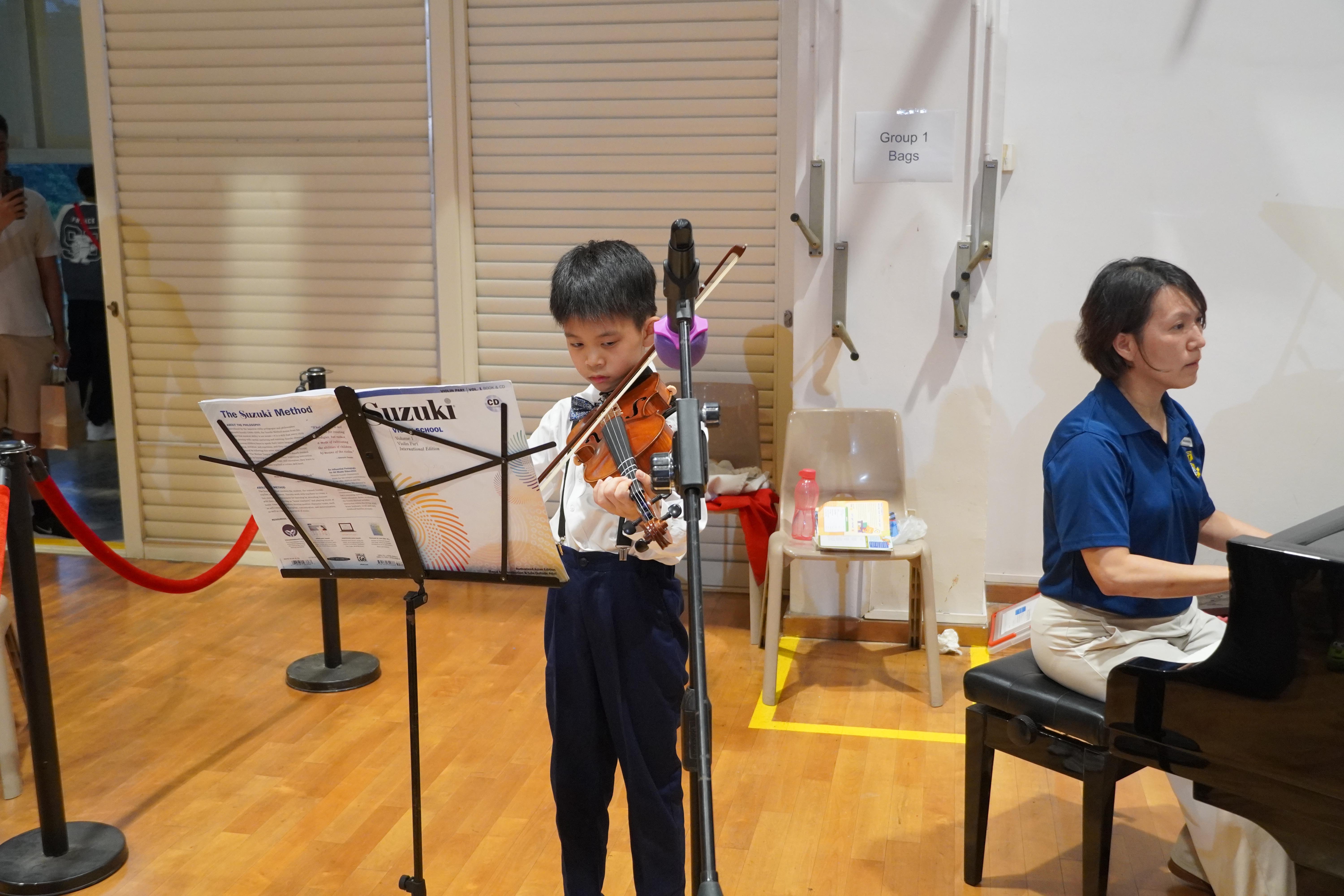A perfect musical partnership! Our student plays with focus and confidence, beautifully accompanied on the piano.